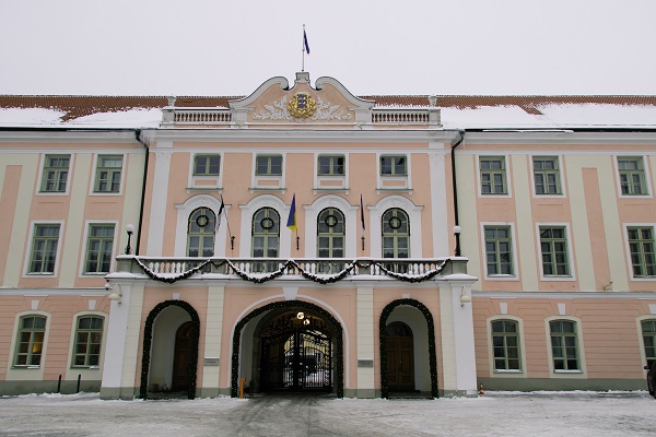 A medieval style castle with flags out front